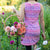 Girl in pink Electra dress with flowers