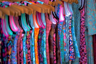 Row of colorful athleisure dresses.
