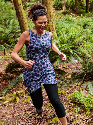 Woman running in Ruu-Muu pocket exercise dress, running dress, travel dress, athletic dress. 