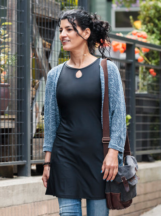 Woman shopping in X-Dress Ruu-Muu pocket exercise dress, running dress, travel dress, athletic dress. 